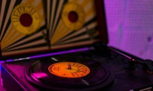 a record player sitting on top of a table